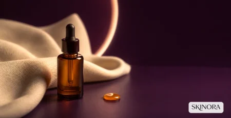Amber retinol serum bottle in a refined evening skincare setting